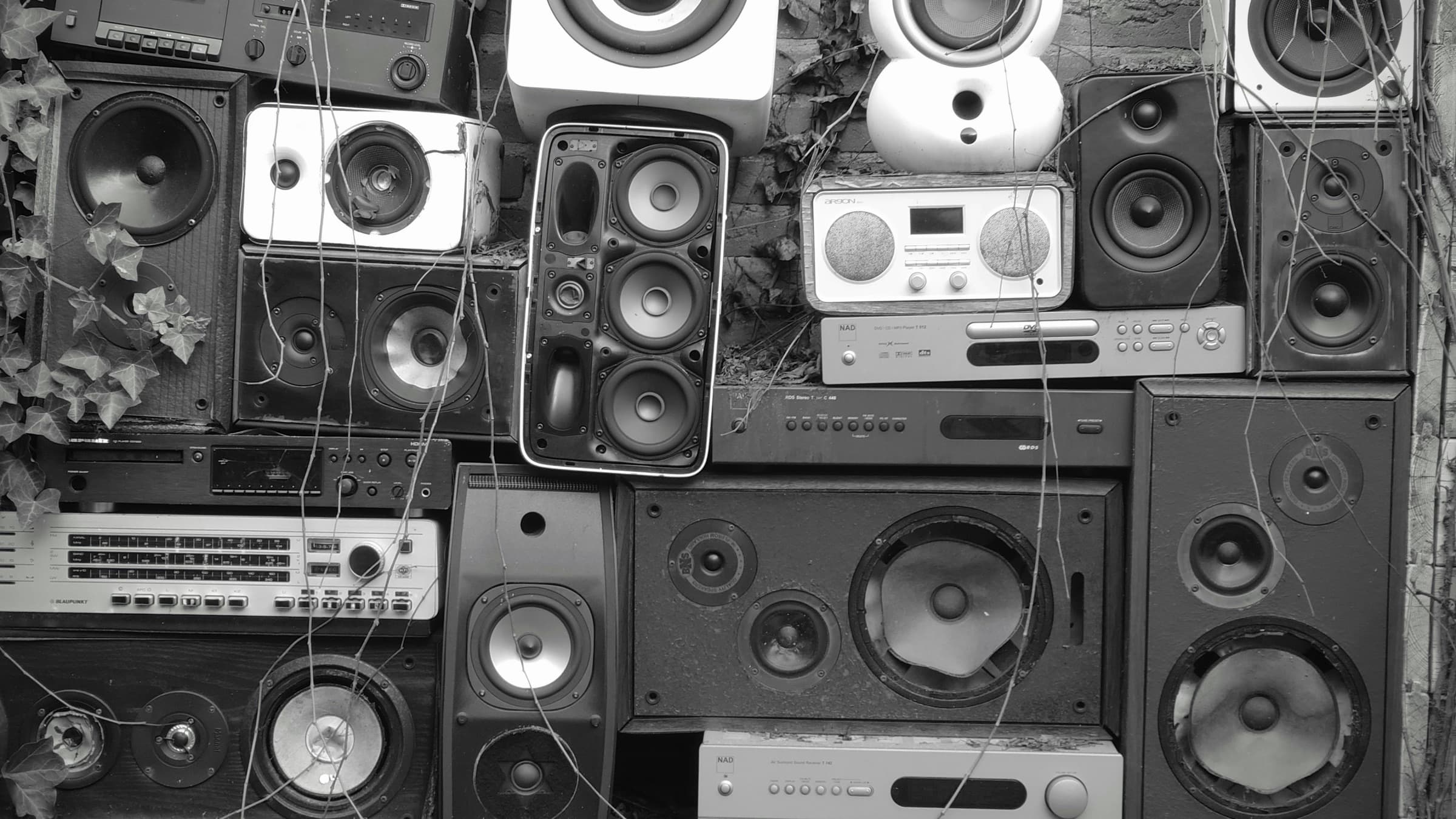 Loudspeakers and audio equipment representing embedded crossover development